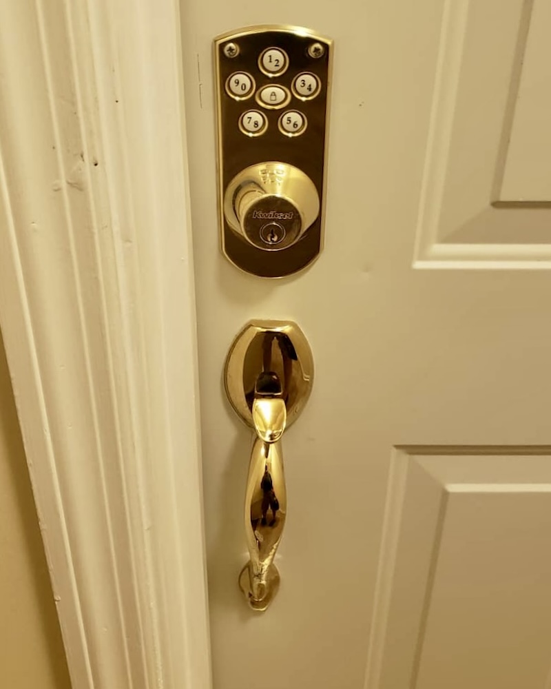 Residential Kwikset keypad lock handleset brass finish